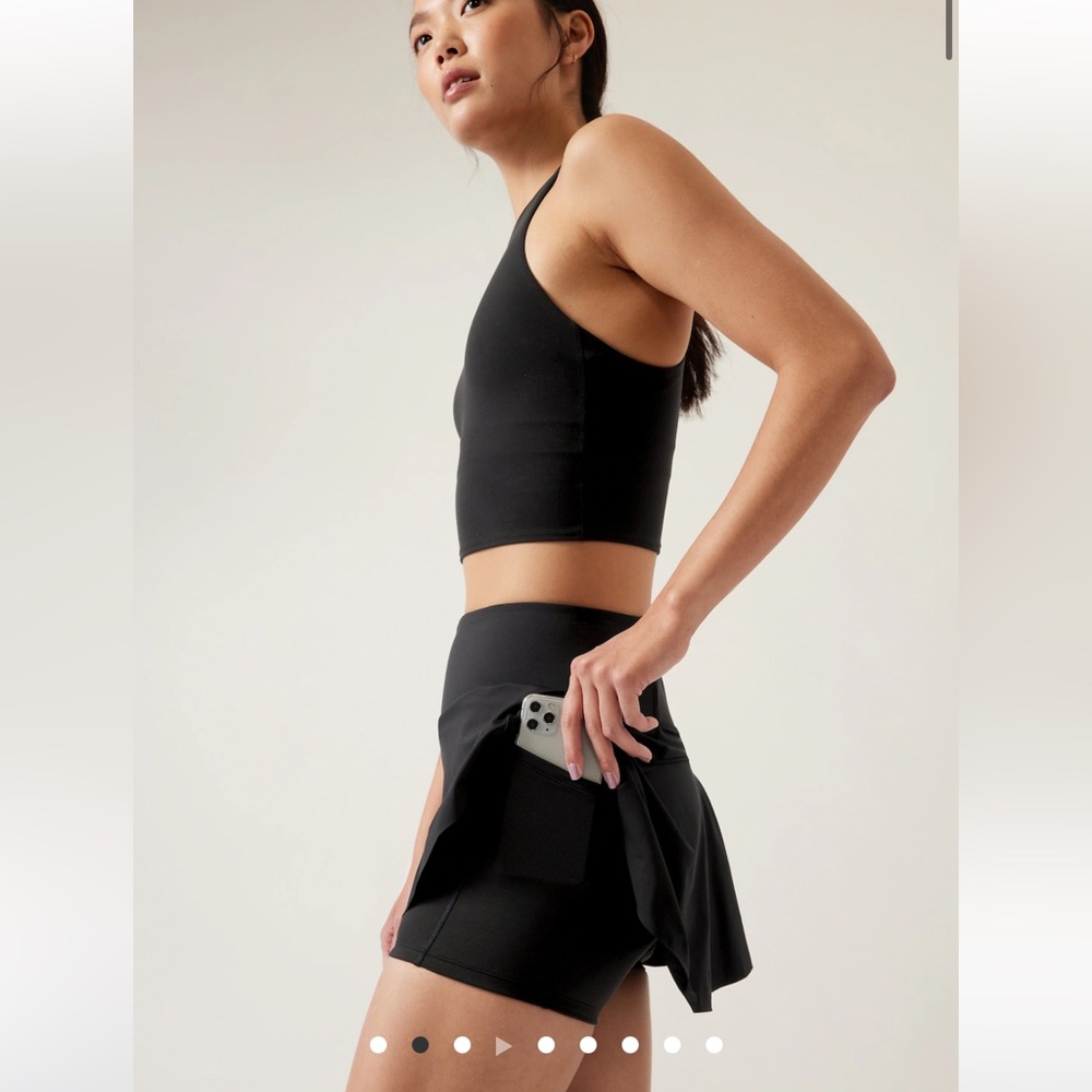 Never worn - athleta tennis skort skirt with shorts under and pockets